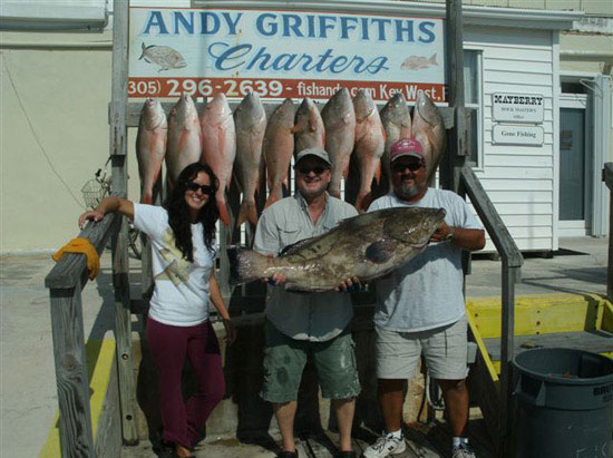 Fishing group displaying their catch